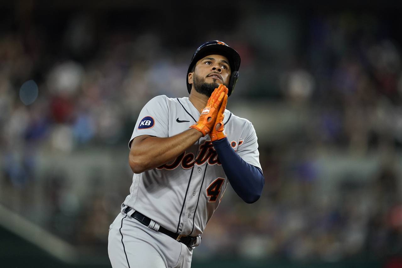 Detroit Tigers' Jeimer Candelario celebrates his two-run home run in the sixth inning of a baseball...