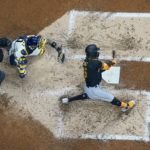 
              Pittsburgh Pirates' Oneil Cruz hits a three-run home run during the fifth inning of a baseball game against the Milwaukee Brewers Monday, Aug. 29, 2022, in Milwaukee. (AP Photo/Morry Gash)
            