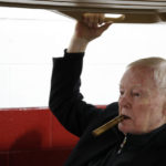 
              FILE - Former Washington quarterback Sonny Jurgensen sits in a golf cart in a tunnel before an NFL football game against the San Francisco 49ers, Sunday, Oct. 20, 2019, in Landover, Md. The Washington Commanders will retire Pro Football Hall of Famer Sonny Jurgensen’s No. 9 later this season. The former Washington quarterback and longtime radio broadcaster will be honored in the team's regular-season finale Jan. 7 or 8 against the rival Dallas Cowboys. (AP Photo/Alex Brandon, File)
            