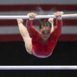 
              Konnor McClain competes on the uneven bars during the U.S. Gymnastics Championships, Sunday, Aug. 21, 2022, in Tampa, Fla. (AP Photo/Mike Carlson)
            