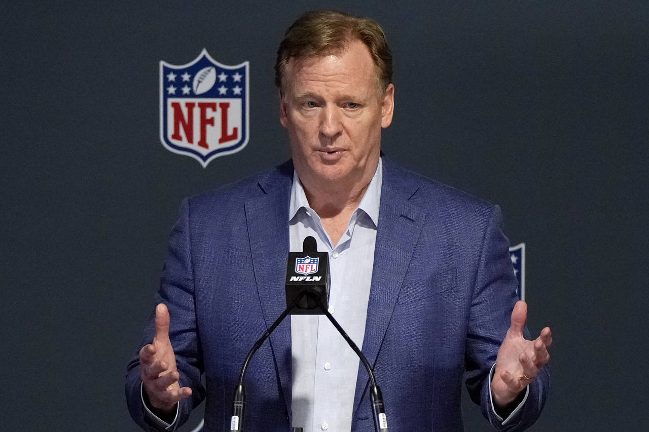 FILE - NFL Commissioner Roger Goodell speaks to the media after the close of the NFL owners' meeti...