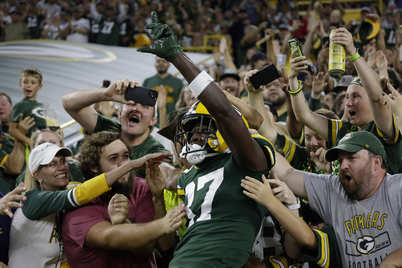 Green Bay Packers' Tyler Goodson runs during the first half of a preseason  NFL football game against the New Orleans Saints Friday, Aug. 19, 2022, in  Green Bay, Wis. (AP Photo/Morry Gash