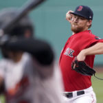 
              Boston Red Sox starting pitcher Josh Winckowski delivers during the first inning of the team's baseball game against the Baltimore Orioles at Fenway Park, Thursday, Aug. 11, 2022, in Boston. (AP Photo/Mary Schwalm)
            