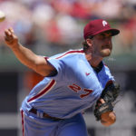 
              Philadelphia Phillies' Aaron Nola pitches during the first inning of a baseball game against the Washington Nationals, Sunday, Aug. 7, 2022, in Philadelphia. (AP Photo/Matt Rourke)
            