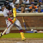 
              Atlanta Braves' Ronald Acuna Jr. hits a single during the fifth inning of the team's baseball game against the New York Mets on Friday, Aug. 5, 2022, in New York. (AP Photo/Frank Franklin II)
            