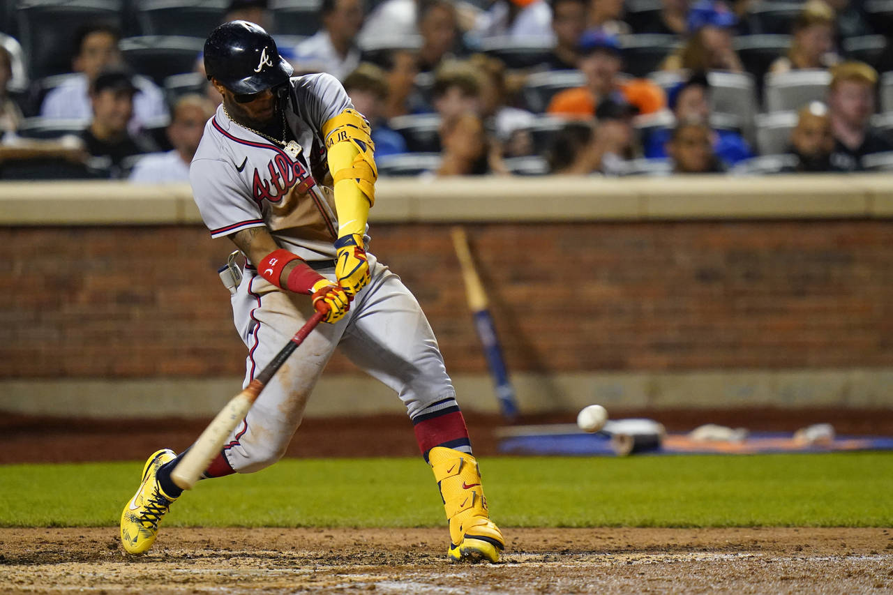 Atlanta Braves' Ronald Acuna Jr. hits a single during the fifth inning of the team's baseball game ...