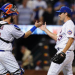 
              New York Mets relief pitcher Seth Lugo, right, celebrates with catcher Tomas Nido after the team's 6-2 win in a baseball game against the Cincinnati Reds on Tuesday, Aug. 9, 2022, in New York. (AP Photo/Frank Franklin II)
            