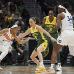 
              Seattle Storm guard Sue Bird (10) defends as Minnesota Lynx guard Moriah Jefferson, left, drives toward the basket during the first half of a WNBA basketball game Wednesday, Aug. 3, 2022, in Seattle. (AP Photo/Ted S. Warren)
            