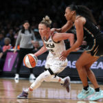 
              Chicago Sky guard Courtney Vandersloot (22) drives to the basket against New York Liberty forward Betnijah Laney (44) during the first half of a WNBA basketball playoff game Tuesday, Aug. 23, 2022, in New York. (AP Photo/Noah K. Murray)
            