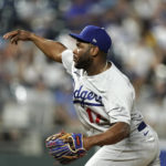 
              Los Angeles Dodgers second baseman Hanser Alberto throws during the ninth inning of a baseball game against the Kansas City Royals Saturday, Aug. 13, 2022, in Kansas City, Mo. The Dodgers won 13-3. (AP Photo/Charlie Riedel)
            