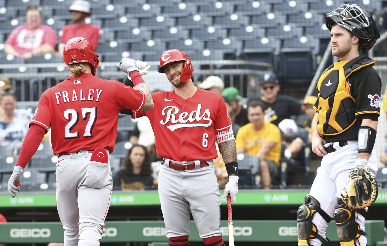 Cincinnati Reds teammates Jake Fraley (27) and Jonathan India (6) celebrate Fraley's leadoff home r...