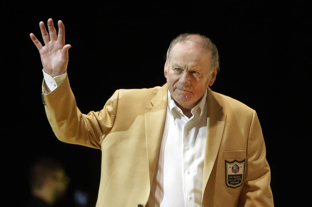 FILE - Len Dawson is introduced before the inaugural Pro Football Hall of Fame Fan Fest Friday, May...