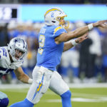 
              Los Angeles Chargers quarterback Easton Stick throws against the Dallas Cowboys during the first half of a preseason NFL football game Saturday, Aug. 20, 2022, in Inglewood, Calif. (AP Photo/Ashley Landis)
            