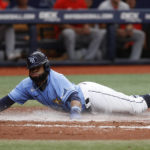 
              Tampa Bay Rays' Manuel Margot slides safely into home against the Los Angeles Angels during the third inning of a baseball game Thursday, Aug. 25, 2022, in St. Petersburg, Fla. (AP Photo/Scott Audette)
            