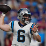 
              Carolina Panthers quarterback Baker Mayfield throws a touchdown pass against the Buffalo Bills during the first half of an NFL preseason football game on Friday, Aug. 26, 2022, in Charlotte, N.C. (AP Photo/Jacob Kupferman)
            