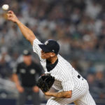 
              New York Yankees' Jonathan Loaisiga pitches during the eighth inning of a baseball game against the Seattle Mariners, Monday, Aug. 1, 2022, in New York. (AP Photo/Frank Franklin II)
            