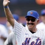 
              Former New York Mets manager Bobby Valentine waves as he is introduced during an Old-Timers' Day ceremony before a baseball game between the Colorado Rockies and the New York Mets on Saturday, Aug. 27, 2022, in New York. (AP Photo/Adam Hunger)
            