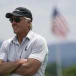 
              LIV GOlf CEO Greg Norman watches the play during the pro-am round of the Bedminster Invitational LIV Golf tournament in Bedminster, N.J., Thursday, July 28, 2022. (AP Photo/Seth Wenig)
            