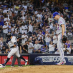 
              New York Mets starting pitcher Max Scherzer, right, reacts as New York Yankees' Aaron Judge, back left, rounds the bases after hitting a home run in the third inning of a baseball game, Monday, Aug. 22, 2022, in New York. (AP Photo/Corey Sipkin)
            