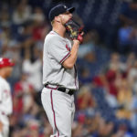 
              Atlanta Braves pitcher Will Smith reacts after giving up a two-run home run to Philadelphia Phillies' J.T. Realmuto during the ninth inning of a baseball game, Tuesday, July 26, 2022, in Philadelphia. (AP Photo/Matt Slocum)
            