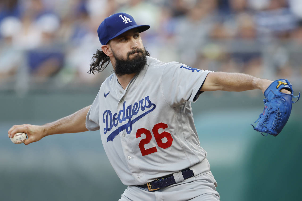 Los Angeles Dodgers pitcher Tony Gonsolin throws to a Kansas City Royals batter during the first in...