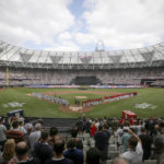 
              FILE - The New York Yankees, left, and the Boston Red Sox lineup for the national anthem before a baseball game in London on June 30, 2019. Major League Baseball plans to return to London next year for the first time since 2019. The league announced Thursday, Aug. 4, 2022, that the St. Louis Cardinals and Chicago Cubs will play a two-game series on June 24-25, 2023, at London Stadium. (AP Photo/Tim Ireland, File)
            