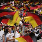 
              FILE - Germany supporters on the stands wave flags before the Women's Euro 2022 final soccer match between England and Germany at Wembley stadium in London, Sunday, July 31, 2022. (AP Photo/Alessandra Tarantino, File)
            