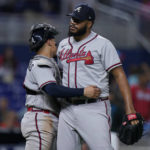 
              Atlanta Braves relief pitcher Kenley Jansen, right, and catcher William Contreras congratulate each other after the Braves beat the Miami Marlins 4-3 in a baseball game, Friday, Aug. 12, 2022, in Miami. (AP Photo/Wilfredo Lee)
            