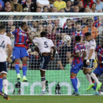
              Arsenal's Gabriel Martinelli, second right, scores his side's opening goal during the English Premier League soccer match between Crystal Palace and Arsenal at Selhurst Park stadium in London, Friday, Aug. 5, 2022. (AP Photo/Ian Walton)
            