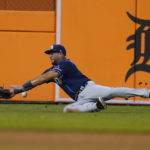 
              Tampa Bay Rays left fielder David Peralta misplays the double hit by Detroit Tigers' Harold Castro during the fifth inning of a baseball game, Thursday, Aug. 4, 2022, in Detroit. (AP Photo/Carlos Osorio)
            