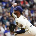 
              Milwaukee Brewers starting pitcher Freddy Peralta throws during the first inning of a baseball game against the Los Angeles Dodgers Monday, Aug. 15, 2022, in Milwaukee. (AP Photo/Morry Gash)
            