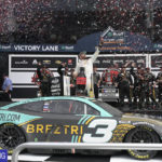 
              Austin Dillon celebrates in Victory Lane after winning a NASCAR Cup Series auto race at Daytona International Speedway, Sunday, Aug. 28, 2022, in Daytona Beach, Fla. (AP Photo/Phelan M. Ebenhack)
            
