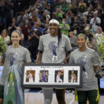
              Seattle Storm guard Sue Bird, left, Minnesota Lynx center Sylvia Fowles, center, and Storm guard Briann January are honored before a WNBA basketball game Friday, Aug. 12, 2022, in Minneapolis. (Elizabeth Flores/Star Tribune via AP)
            