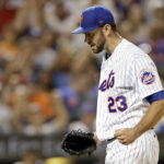 
              New York Mets pitcher David Peterson reacts after the final out of the sixth inning of a baseball game against the Colorado Rockies on Saturday, Aug. 27, 2022, in New York. (AP Photo/Adam Hunger)
            