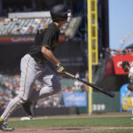 
              Pittsburgh Pirates' Bryan Reynolds, left, watches his three-run home run off of San Francisco Giants pitcher John Brebbia, right, during the seventh inning of a baseball game in San Francisco, Sunday, Aug. 14, 2022. (AP Photo/Jeff Chiu)
            