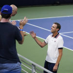 
              Sam Querrey, of the United States, is greeted by fans after a match Ilya Ivashka during the first round of the US Open tennis championships, Tuesday, Aug. 30, 2022, in New York. (AP Photo/Charles Krupa)
            