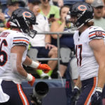 
              Chicago Bears tight end Jake Tonges, left, celebrates with tight end Chase Allen, right, after Tonges scored a touchdown during the first half of a preseason NFL football game against the Seattle Seahawks, Thursday, Aug. 18, 2022, in Seattle. (AP Photo/Stephen Brashear)
            
