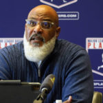 
              FILE - Major League Baseball Players Association Executive Director Tony Clark answers a question at a press conference in their offices in New York, Friday, March 11, 2022. The Major League Baseball Players Association is attempting to unionize minor leaguers, reversing decades of opposition. The players' association said Monday, Aug. 29, 2022,  it is circulating union authorization cards among players with minor league contracts to form a separate bargaining unit from the big leaguers. (AP Photo/Richard Drew, File)
            