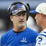 
              Indianapolis Colts head coach Frank Reich talks with quarterback Matt Ryan during first half of an NFL preseason football game against the Detroit Lions in Indianapolis, Saturday, Aug. 20, 2022. (AP Photo/AJ Mast)
            