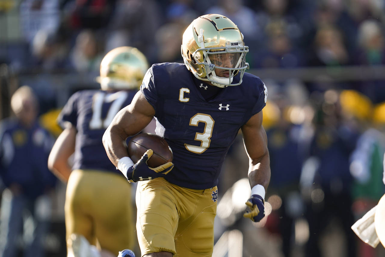 FILE - Notre Dame wide receiver Avery Davis (3) runs against Navy in the first half of an NCAA coll...