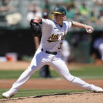 
              Oakland Athletics' JP Sears pitches against the Los Angeles Angels during the second inning of a baseball game in Oakland, Calif., Wednesday, Aug. 10, 2022. (AP Photo/Jeff Chiu)
            