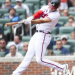 
              Atlanta Braves' Matt Olson hits a two-run home run in the first inning of a baseball game against the Houston Astros, Sunday, Aug. 21, 2022, in Atlanta. (AP Photo/Hakim Wright Sr.)
            