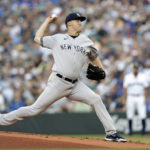 
              New York Yankees starting pitcher Jameson Taillon works against the Seattle Mariners during the first inning of a baseball game, Monday, Aug. 8, 2022, in Seattle. (AP Photo/John Froschauer)
            