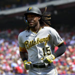 
              Pittsburgh Pirates' Oneil Cruz reacts after scoring on a single hit by Ke'Bryan Hayes during the first inning of baseball game against the Philadelphia Phillies, Sunday, Aug. 28, 2022, in Philadelphia. (AP Photo/Derik Hamilton)
            