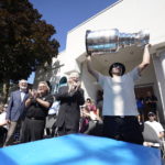 
              NHL player Nazem Kadri hoist the Stanley Cup in front of the London Muslim Mosque in London, Ontario on Saturday Aug. 27, 2022. Kadri, 31, won the cup for the first time while playing with the Colorado Avalanche.  (Geoff Robins /The Canadian Press via AP)
            