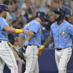 
              Tampa Bay Rays' Randy Arozarena, right, greets Jose Siri (22) after he hit a three-run home run off Baltimore Orioles starter Jordan Lyles during the third inning of a baseball game Sunday, Aug. 14, 2022, in St. Petersburg, Fla. (AP Photo/Steve Nesius)
            