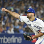 
              Toronto Blue Jays relief pitcher Zach Pop throws to a Cleveland Guardians batter during the fifth inning of a baseball game Friday, Aug. 12, 2022, in Toronto. (Jon Blacker/The Canadian Press via AP)
            