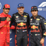 
              Red Bull driver Max Verstappen of the Netherlands, center, clocking the fastest time, poses with Ferrari driver Carlos Sainz of Spain, left, clocking the second fastest time and Red Bull driver Sergio Perez of Mexico, clocking the third fastest time in the qualifying session ahead of the Formula One Grand Prix at the Spa-Francorchamps racetrack in Spa, Belgium, Saturday, Aug. 27, 2022. The Belgian Formula One Grand Prix will take place on Sunday. (AP Photo/Geert Vanden Wijngaert, Pool)
            