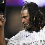 
              As fans applaud his effort, Colorado Rockies starting pitcher Jose Urena tips his cap in appreciation after being pulled following a single by San Francisco Giants' Brandon Crawford during the seventh inning of a baseball game Friday, Aug. 19, 2022, in Denver. (AP Photo/David Zalubowski)
            