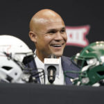 
              FILE - Baylor head coach Dave Aranda smiles while speaking at the NCAA college football Big 12 Media Days in Arlington, Texas, Wednesday, July 13, 2022. The Big 12 is going into its 12th and final season as a 10-team conference. (AP Photo/LM Otero, File)
            
